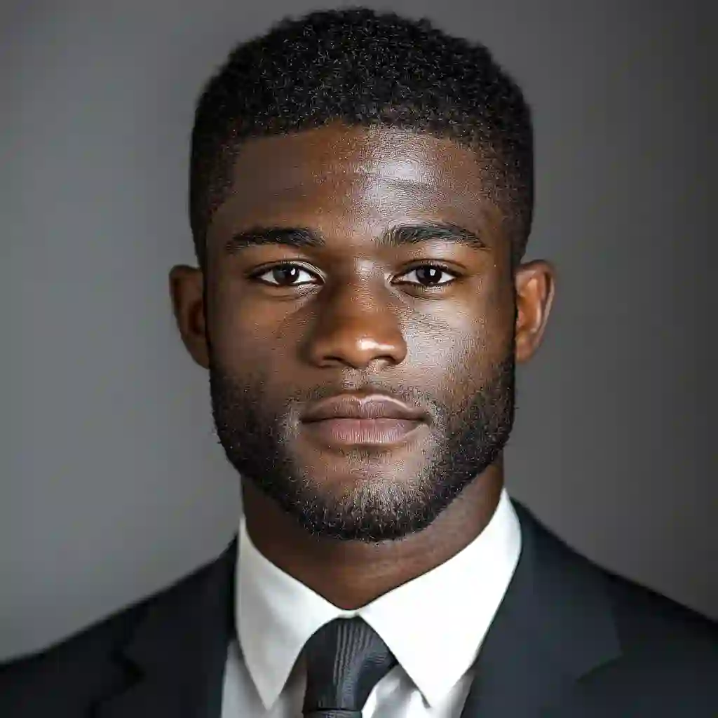 Image of an african man under 25 in a business suit